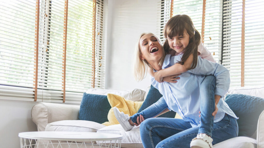 A mom and daughter moving into a Quality LDG Apartment