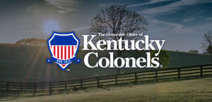 Kentucky Colonels logo over rolling hills in Kentucky.